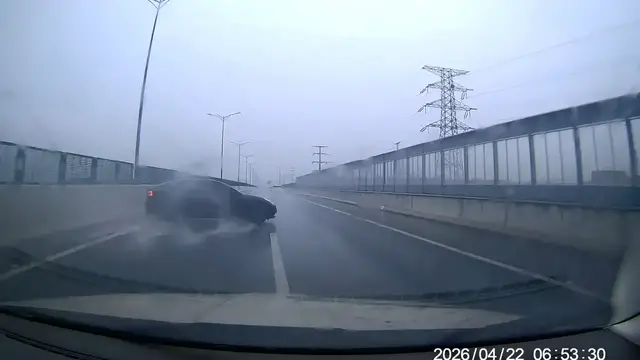 Video thumbnail for Car Spins Out on Rainy Highway in Zhejiang