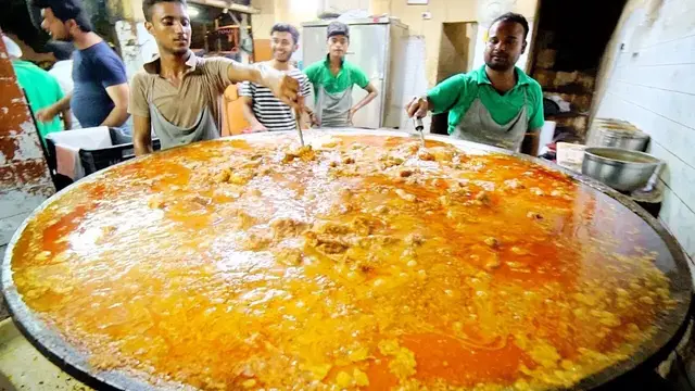 'Video thumbnail for CURRY MASTER of INDIA | Indian Street Food - HUGE 100KG CURRY in Old Delhi + SPICY Street Food'