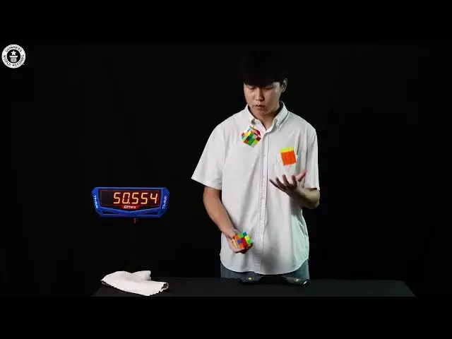 Video thumbnail for Fastest Juggle and Solve of Three Cubes EVER!
