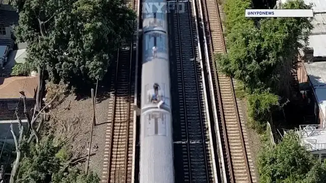 Video thumbnail for 'That’s insane.' Commuters react to shocking video of teens subway surfing in Brooklyn
