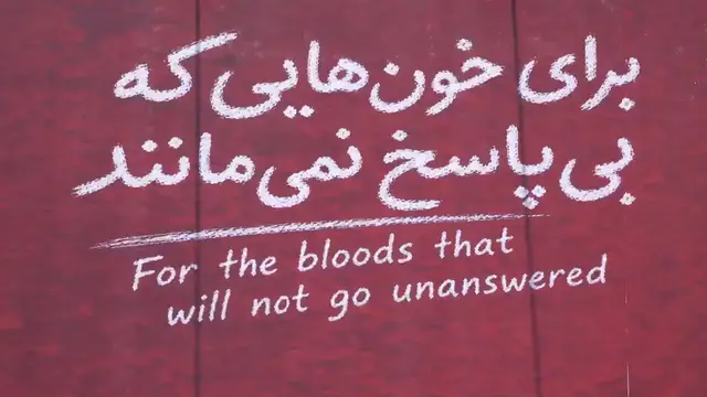 Video thumbnail for Iran: Anti-US billboard targeting Trump installed in central Tehran.