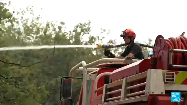 Video thumbnail for Blaze battle rages in France as wildfire stable but not contained