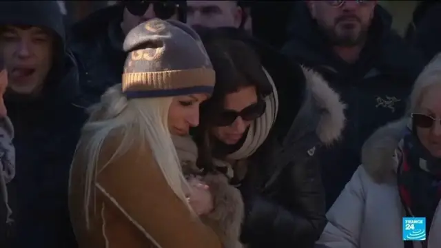 Video thumbnail for Fire in Switzerland: Crowd gathers for deadly fire victims