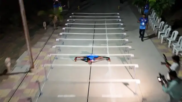'Video thumbnail for Fastest time to limbo skate under descending poles over 50m - 7.46 seconds by Shrishti Sharma'