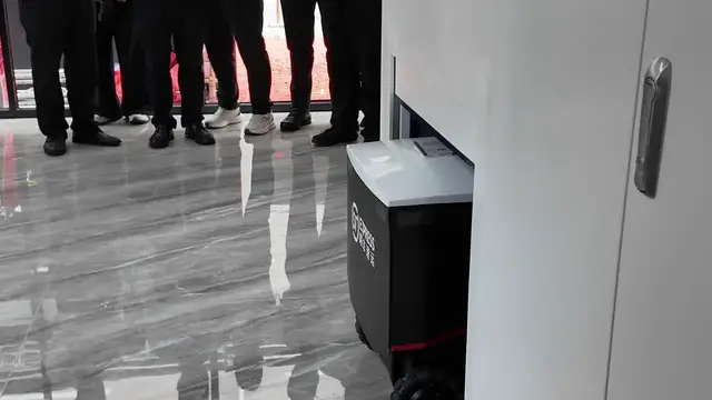 Video thumbnail for China: Delivery Robots Roll Out on Shenzhen Campus.