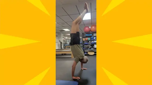 'Video thumbnail for Oldest person to do a handstand - Paul Budline at 74 years and 145 days old'