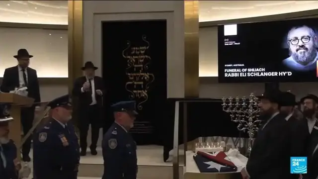 Video thumbnail for Funerals of Bondi Beach victims begin in Australia