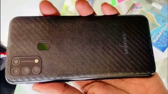 Video thumbnail for Samsung m31 back sticker Carbon Fiber  Scratch Protection