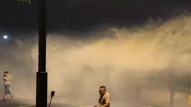 Video thumbnail for China: Powerful ‘Ghost King Tide’ crashes ashore and knocks down tourists in China.
