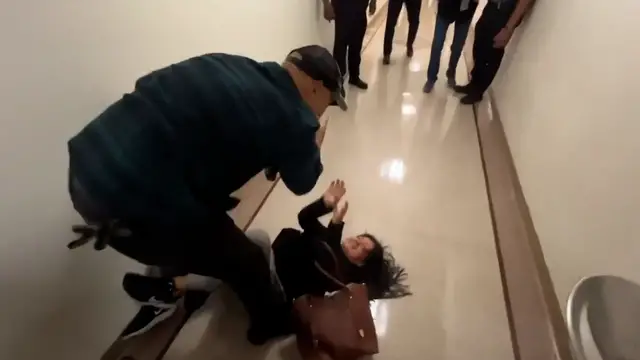 'Video thumbnail for ICE officer slams woman to the ground at immigration court'