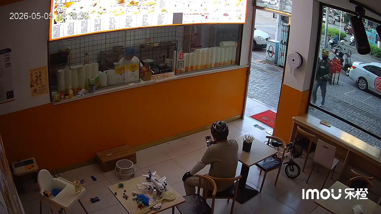 Video thumbnail for China: Delivery rider’s scooter is hit while he waits for food in China.