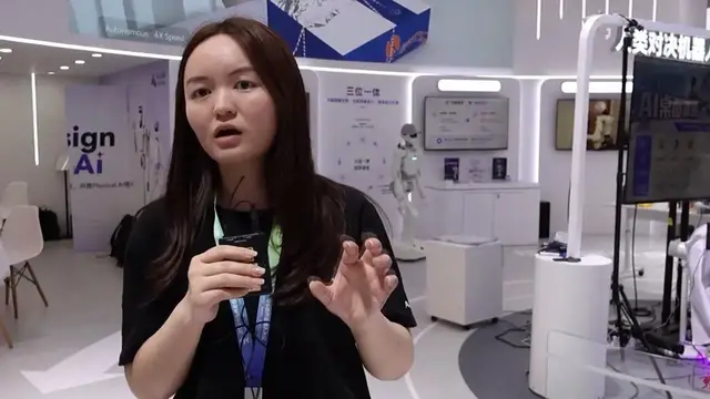 Video thumbnail for China: Human-machine 'co-creation' on show at World Robot Conference.