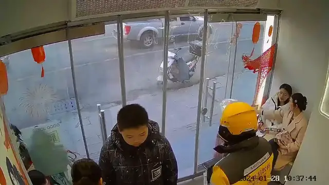 Video thumbnail for China: Chinese rider accidentally shatters glass door after reaching back to close it.