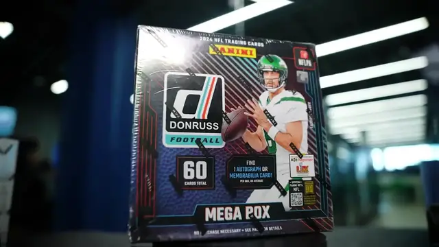 'Video thumbnail for Sports Card Investor: opening $1000 of football cards! panini select & rookie pulls!'