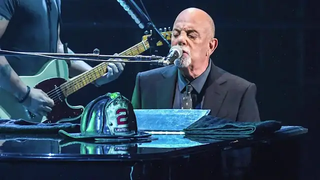 Video thumbnail for The story behind Billy Joel’s FDNY helmet photo, 25 years later