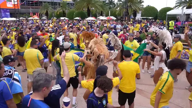 Video thumbnail for US: Brazil and Scotland supporters create festive atmosphere ahead of decisive World Cup clash in Miami.