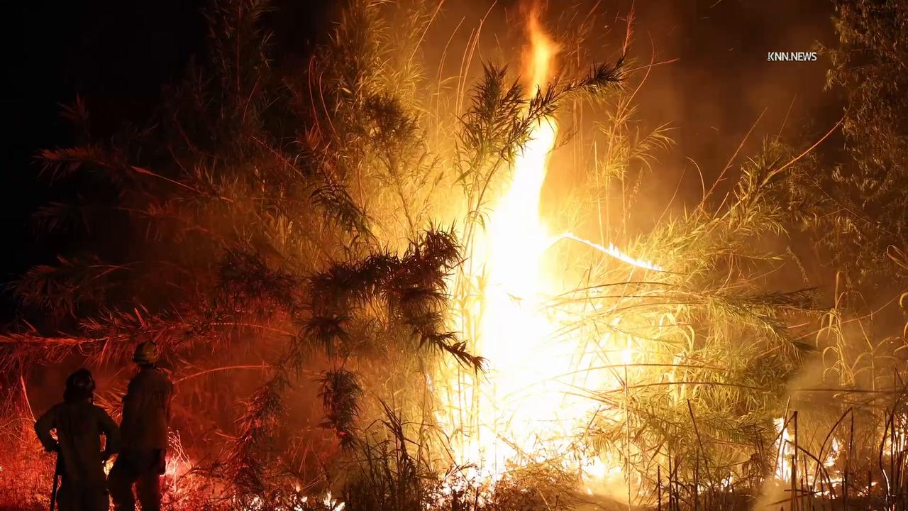 Video thumbnail for US, Bakersfield: Bakersfield Thick Vegetation Fire in Riverbed.