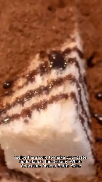 Video thumbnail for dreamy white chocolate peanut butter cake recipe