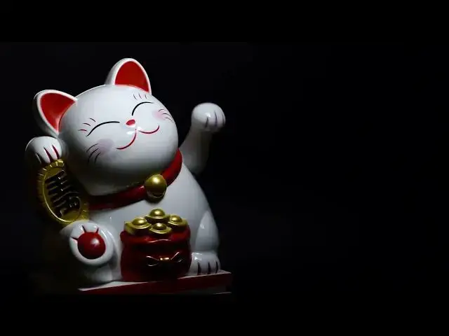 Video thumbnail for Waving cat