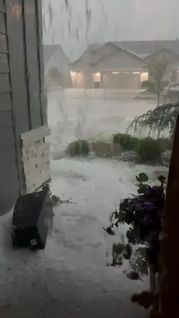 Video thumbnail for Neighborhood Flooded by Sudden Hail and Rain Storm in June