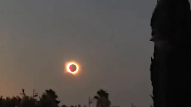 Video thumbnail for Spain: Stunning total solar eclipse amazes spectators in Spain.