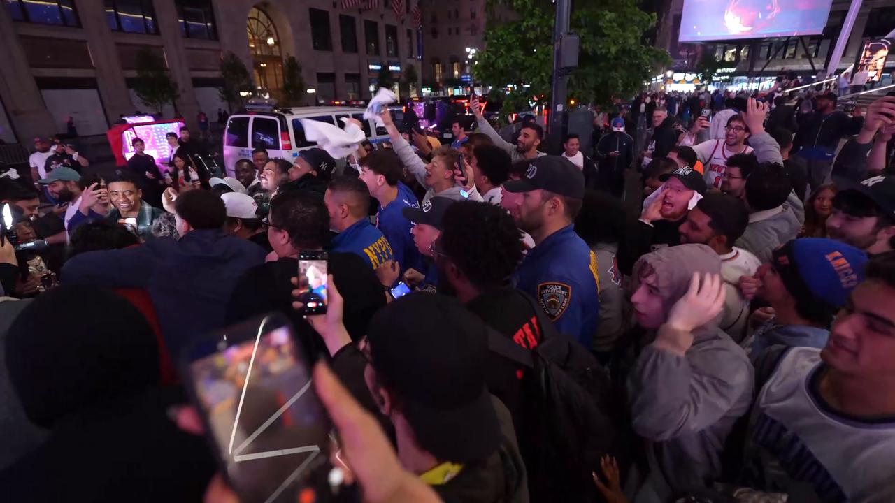 Video thumbnail for US: Knicks fans celebrate Game 2 win over 76ers in rainy New York.