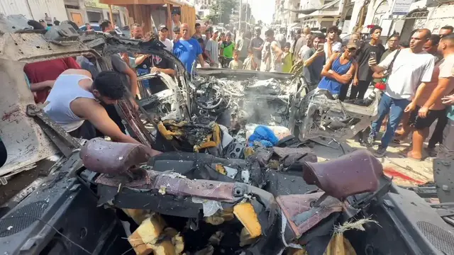 Video thumbnail for 2 Palestinians killed, 13 injured in Israeli drone strike on vehicle in Gaza.