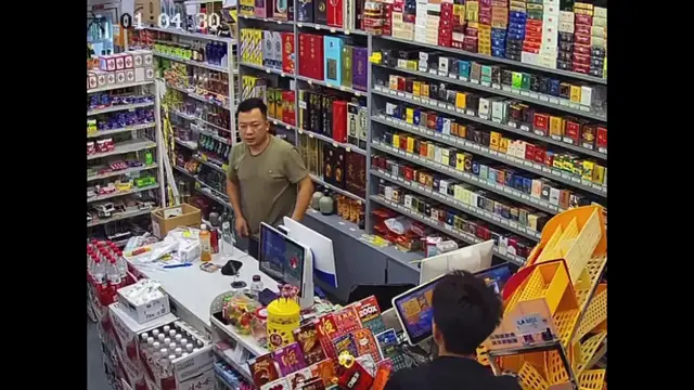 Video thumbnail for China: Chinese man’s e-bike smashes into supermarket checkout counter.