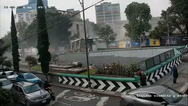 Video thumbnail for Mexico: MOMENT - Building under demolition partially collapses onto road in Mexico City.