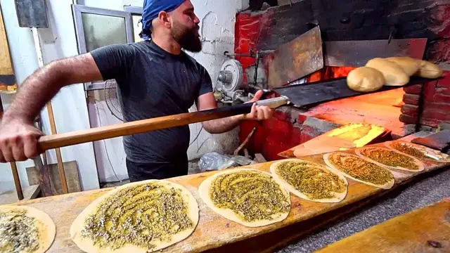 'Video thumbnail for LEBANON STREET FOOD Tour in Saida!! AMAZING Lebanese Food Lunch! The BEST Man'oushe in Lebanon!'