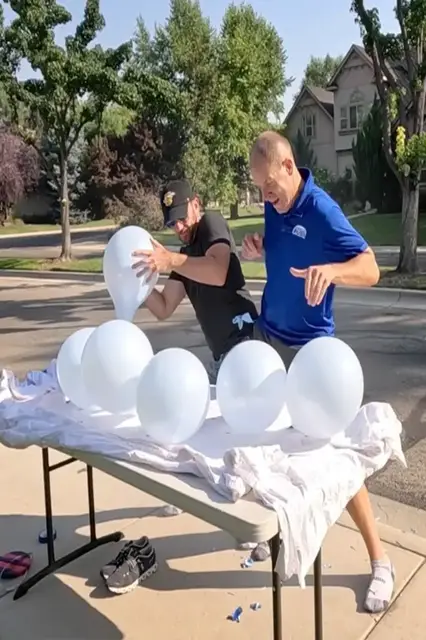 Video thumbnail for Fastest time to pop 10 balloons between two people  7.49 seconds by Jonathan Hannon and David Rush