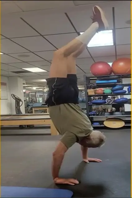 'Video thumbnail for Oldest person to do a handstand - Paul Budline at 74 years and 145 days old'