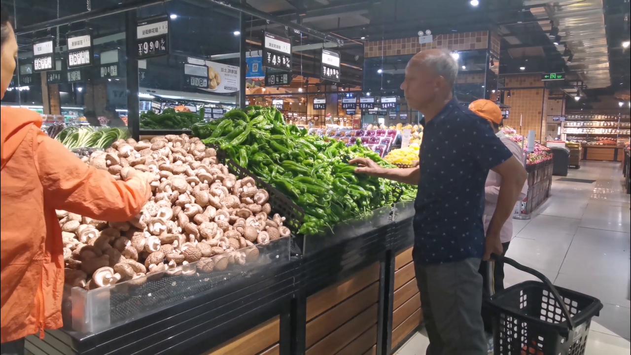 Video thumbnail for China: Consumers Purchase Consumer Goods in A Supermarket.