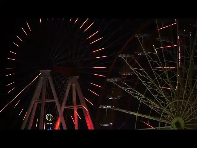 Video thumbnail for LIGHT DISPLAY OF OBSERVATION WHEEL IN MOTION AT NIGHT