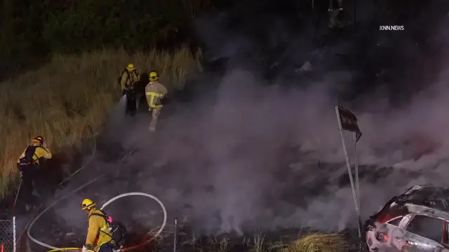Video thumbnail for US, Los Angeles: Brentwood Brush Fire Ignited by Vehicle Fire on Freeway.