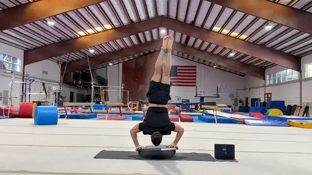 Video thumbnail for Most handstand push ups on a half balance ball in 30 seconds (male) - 27 by Andy Campos Cosme