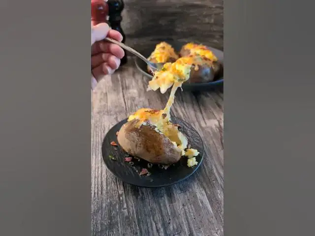 'Video thumbnail for Easy and CHEESY Baked Potato Recipe #baked #easyrecipe #potatorecipe'