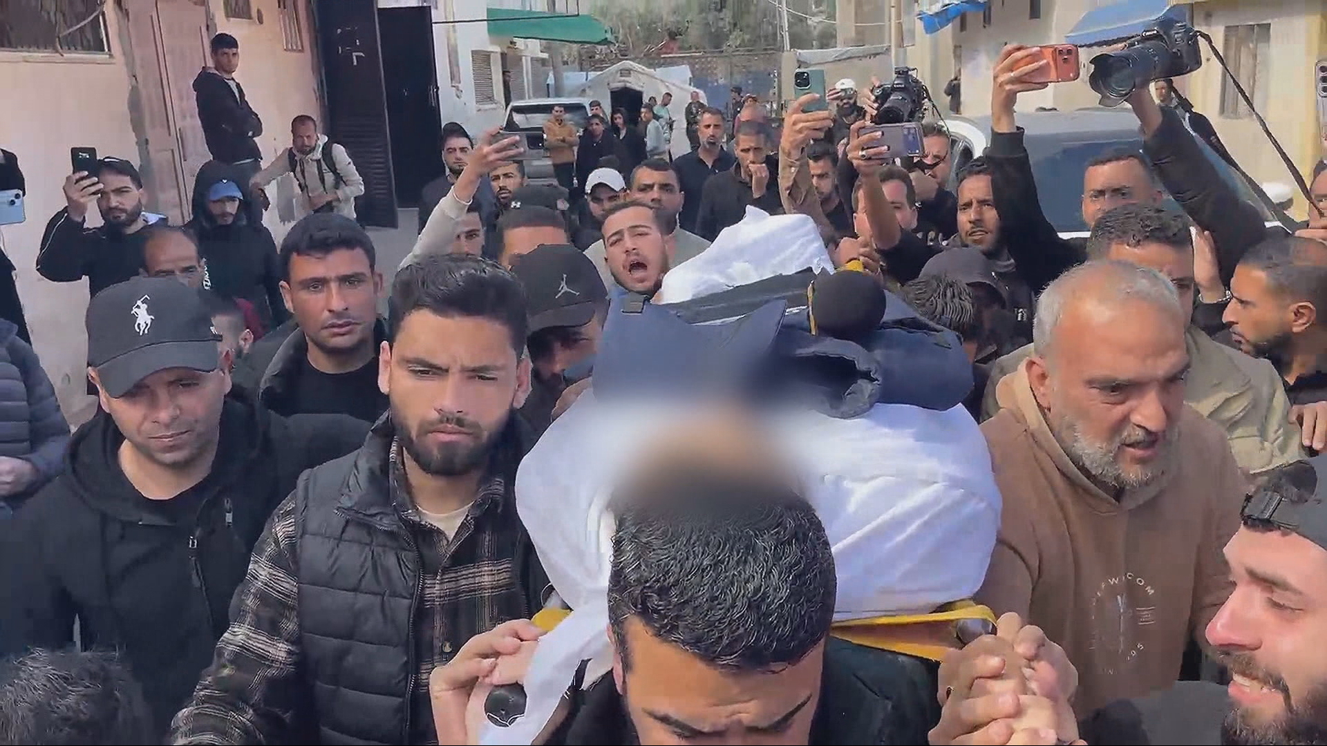 Video thumbnail for Funeral held for Al Jazeera’s Wishah killed in Israeli strike in Gaza