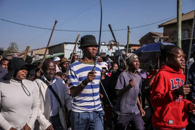 Video thumbnail for Tense standoff at an anti-migrant protest in a South African town