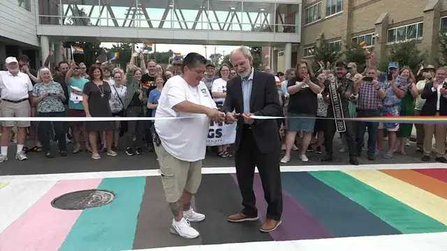 Video thumbnail for Stratford LGBTQIA+ community cuts ribbon on rainbow crosswalk, despite recent acts of vandalism