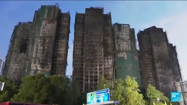 Video thumbnail for Hong Kong fire death toll rises to 128, around 200 still missing