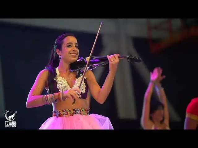 Video thumbnail for KAMARIYA GARBA AT ASIAN  FAIR FESTIVAL WITH VIOLIN, DHOL, AFRICAN DRUMS AND BUTTERFLY WINGS