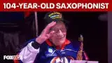 Video thumbnail for 104-year-old WWII veteran performs saxophone national anthem at Islanders-Rangers game