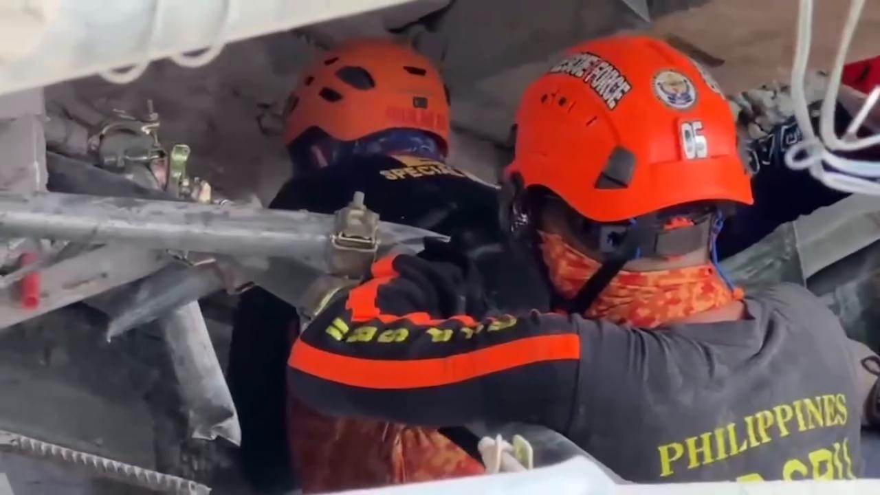 Video thumbnail for Philippines: 26 rescued after Philippines building collapse (2).