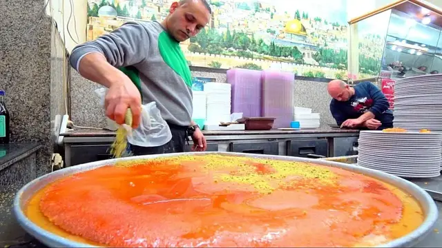 'Video thumbnail for Jerusalem's BEST Street Food Guide - PALESTINIAN HUMMUS NINJA + HUGE Old Jerusalem Street Food Tour!'