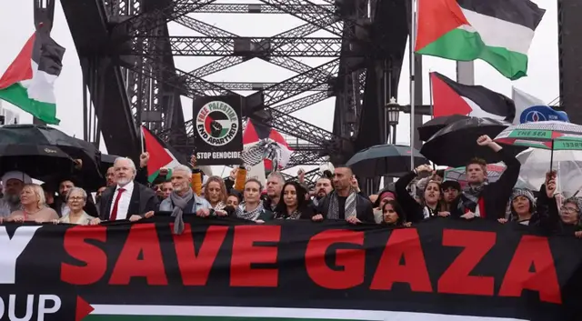 'Video thumbnail for Mass Gaza solidarity rally shuts Sydney Harbour Bridge amid calls for ceasefire and aid'