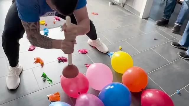 Video thumbnail for Most Balloons Popped With A Plunger In 30 Seconds