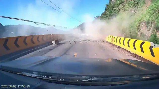 Video thumbnail for China: Chinese driver watches car ahead get crushed by falling rock on mountain road.