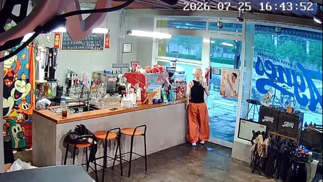 Video thumbnail for China: Cat makes dramatic sliding entrance into shop during typhoon in China.