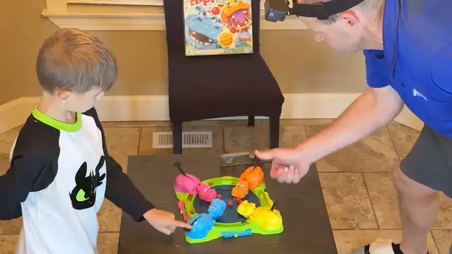 Video thumbnail for Fastest time to clear a game of Hungry Hungry Hippos (team of two) - 5.8 seconds by David and Peter Rush